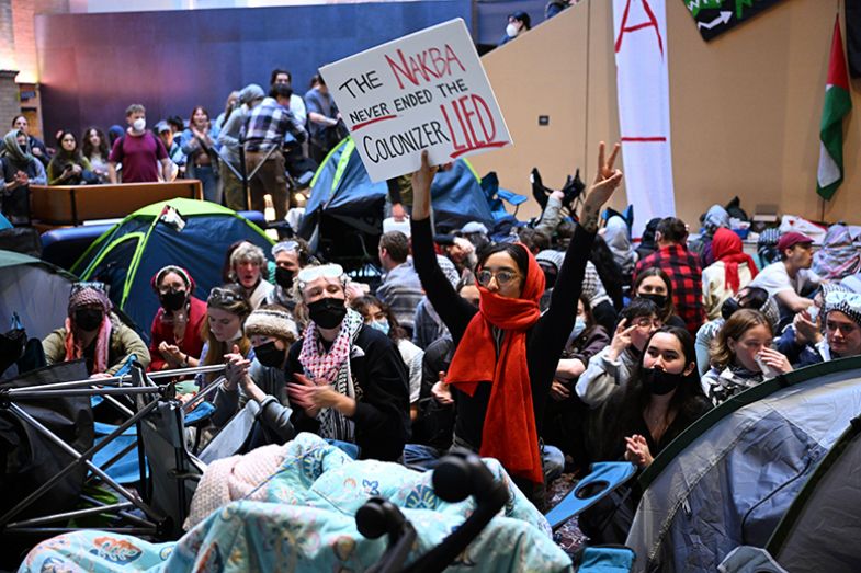 Protesters gather inside of building at Melbourne University in Melbourne, Wednesday, 15 May 2024. An encampment at Melbourne University has been ordered to be dismantled. Protesters gather inside of building at Melbourne University in Melbourne, Wednesday, 15 May 2024. An encampment at Melbourne University has been ordered to be dismantled.